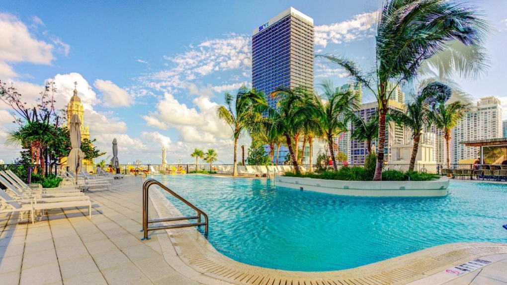 Limo and black car service from Miami Airport to Magic Miami Penthouse Balcony Ocean View