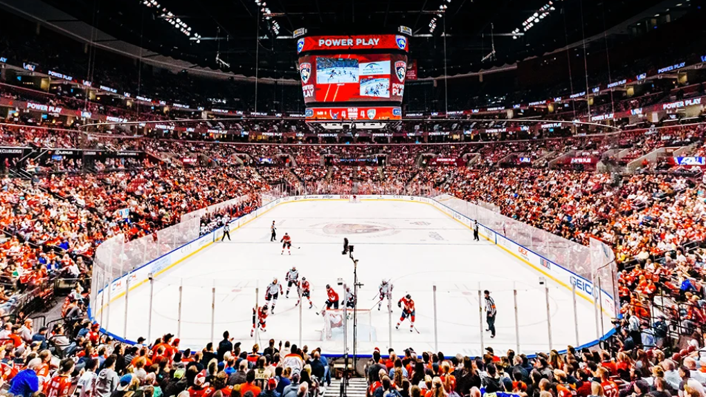 Florida Panthers NHL game with fans cheering in arena