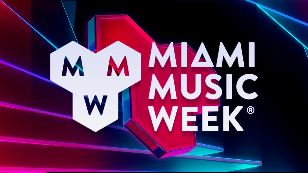 Crowd enjoying electronic music during Miami Music Week at Miami Beach